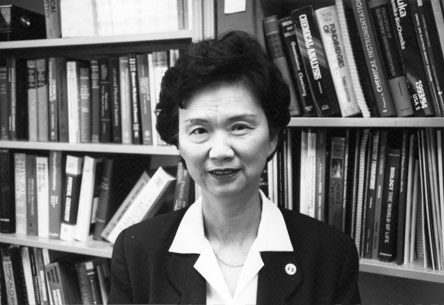 Julia Tai in front of bookshelf (1995)